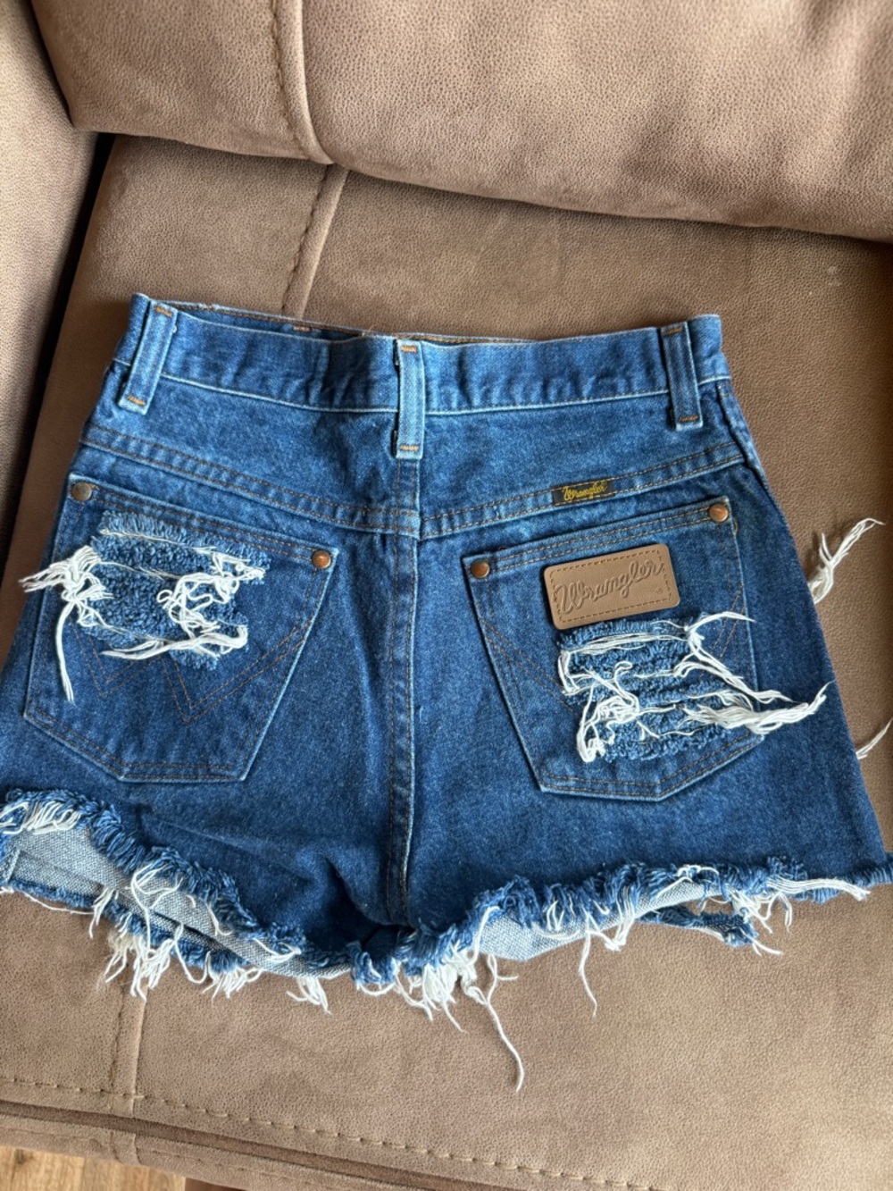 Distressed wrangler shorts